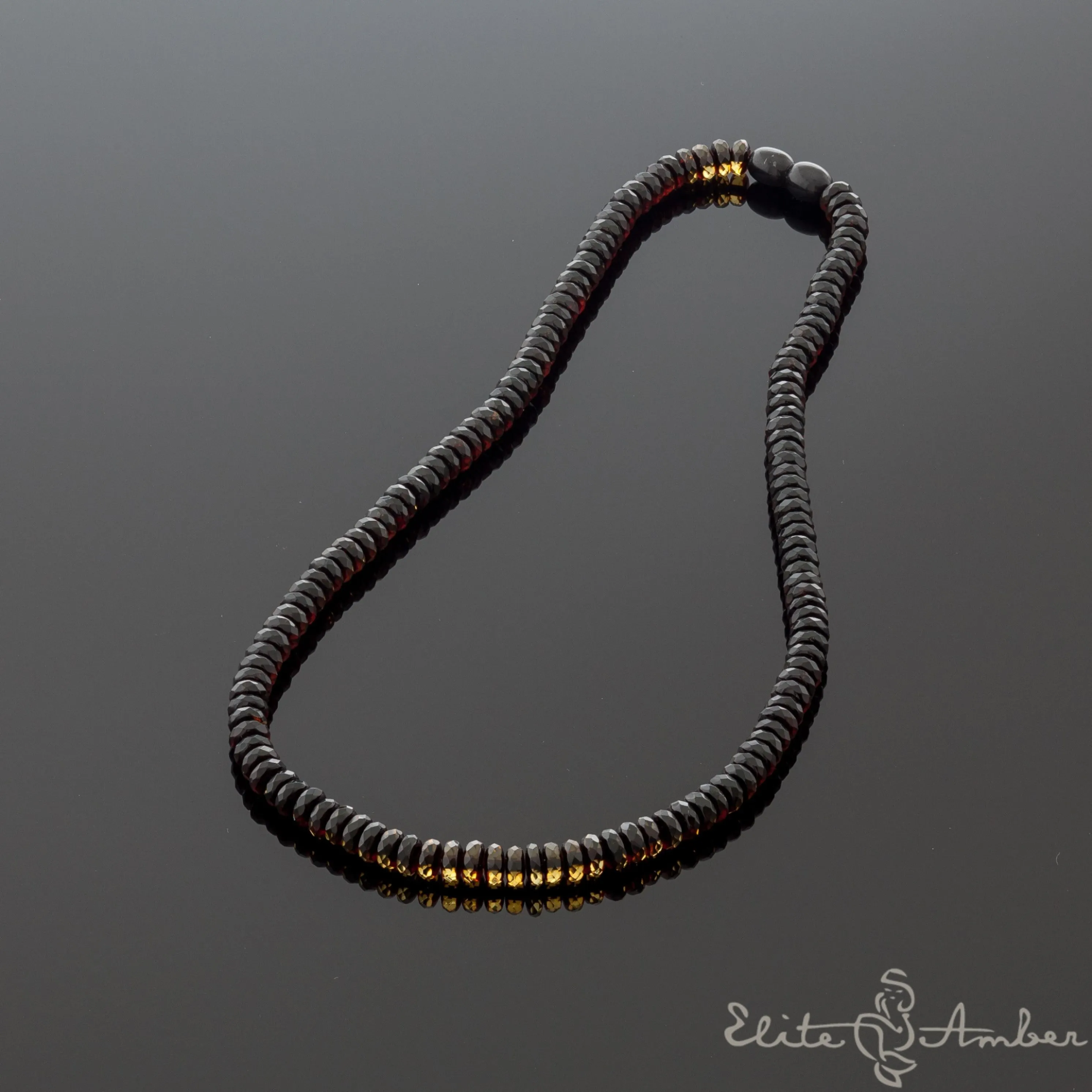 Amber necklace "Glossy black moon"