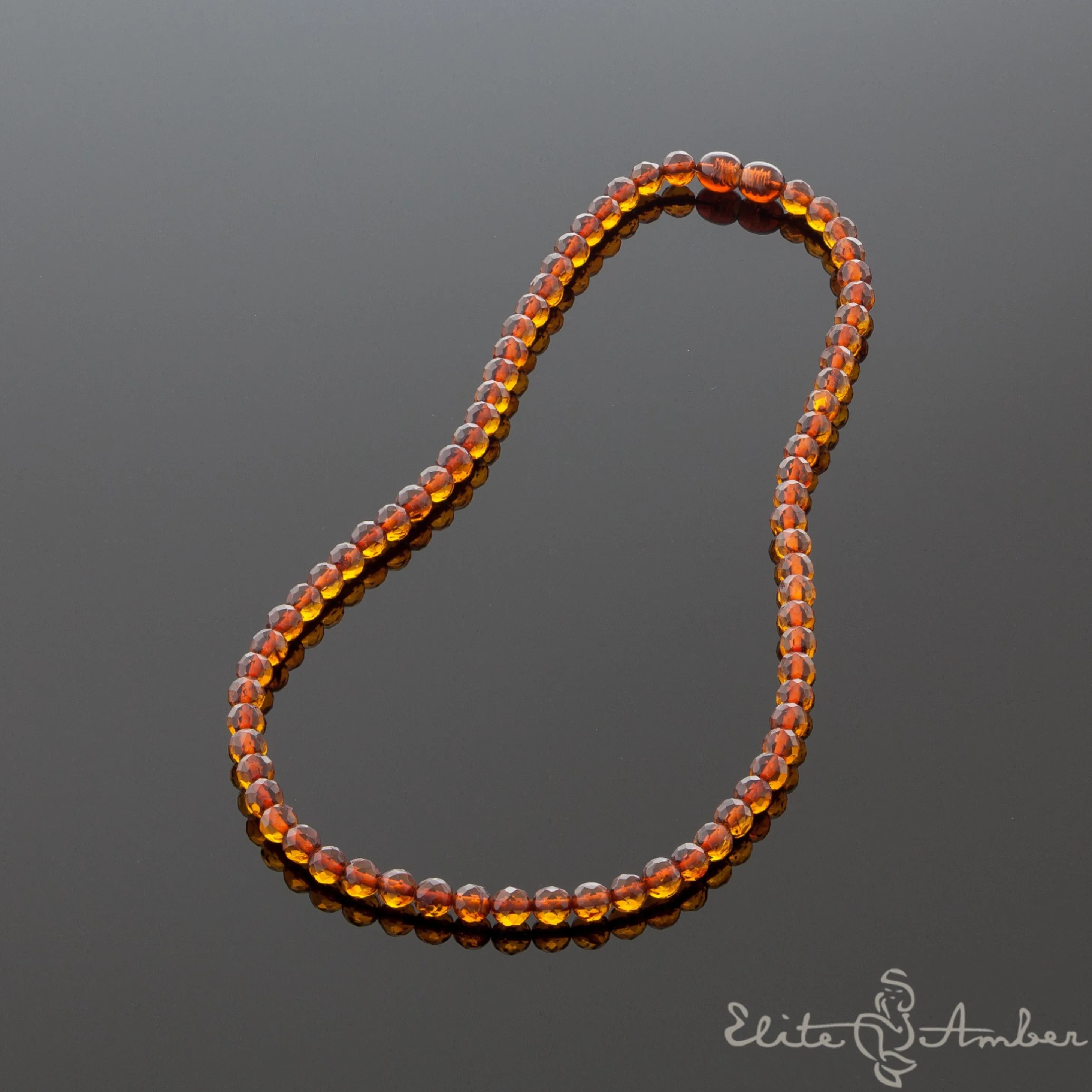 Amber necklace "Glossy cognac"