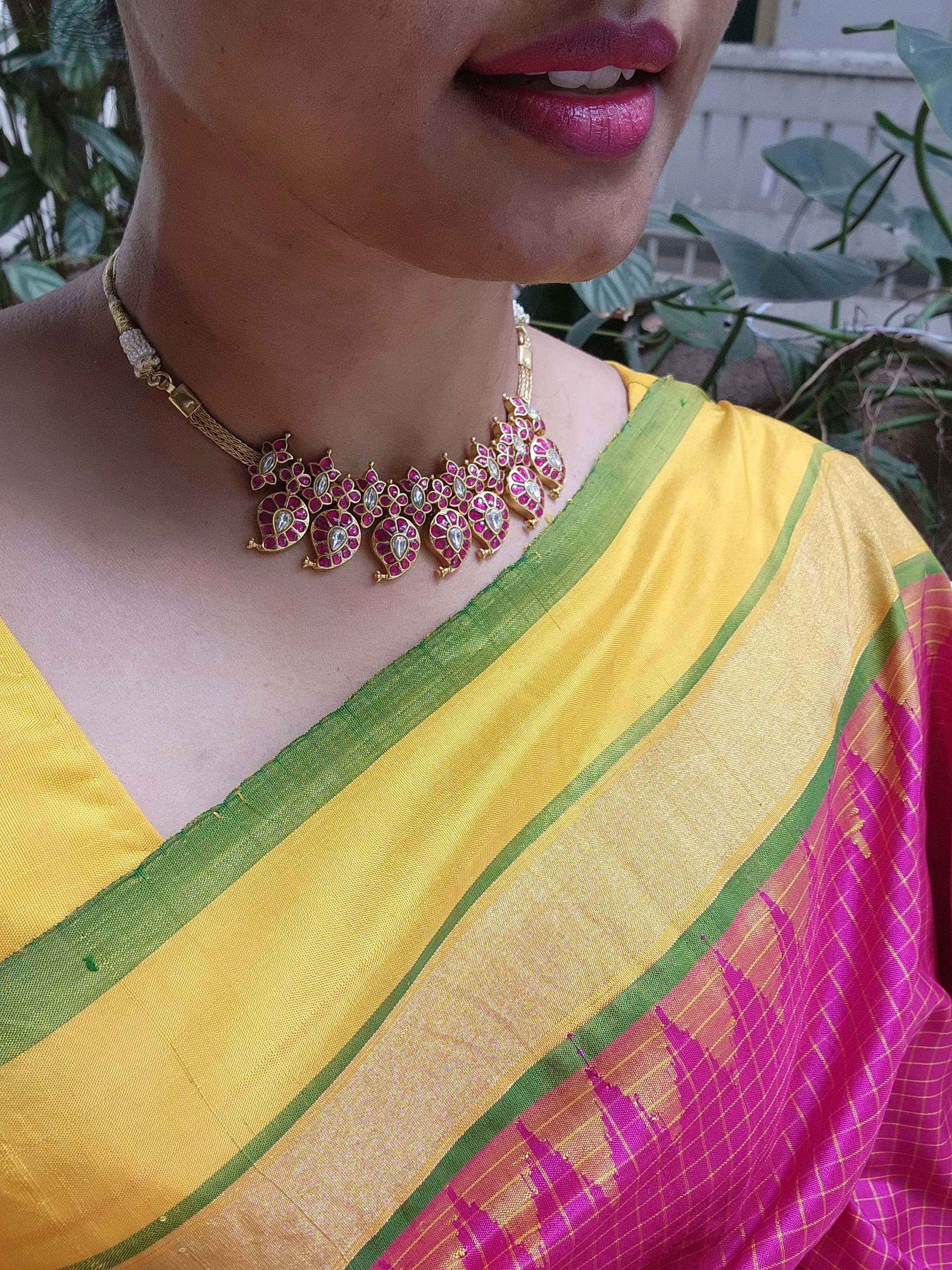 Gold polish kundan & ruby paisley necklace