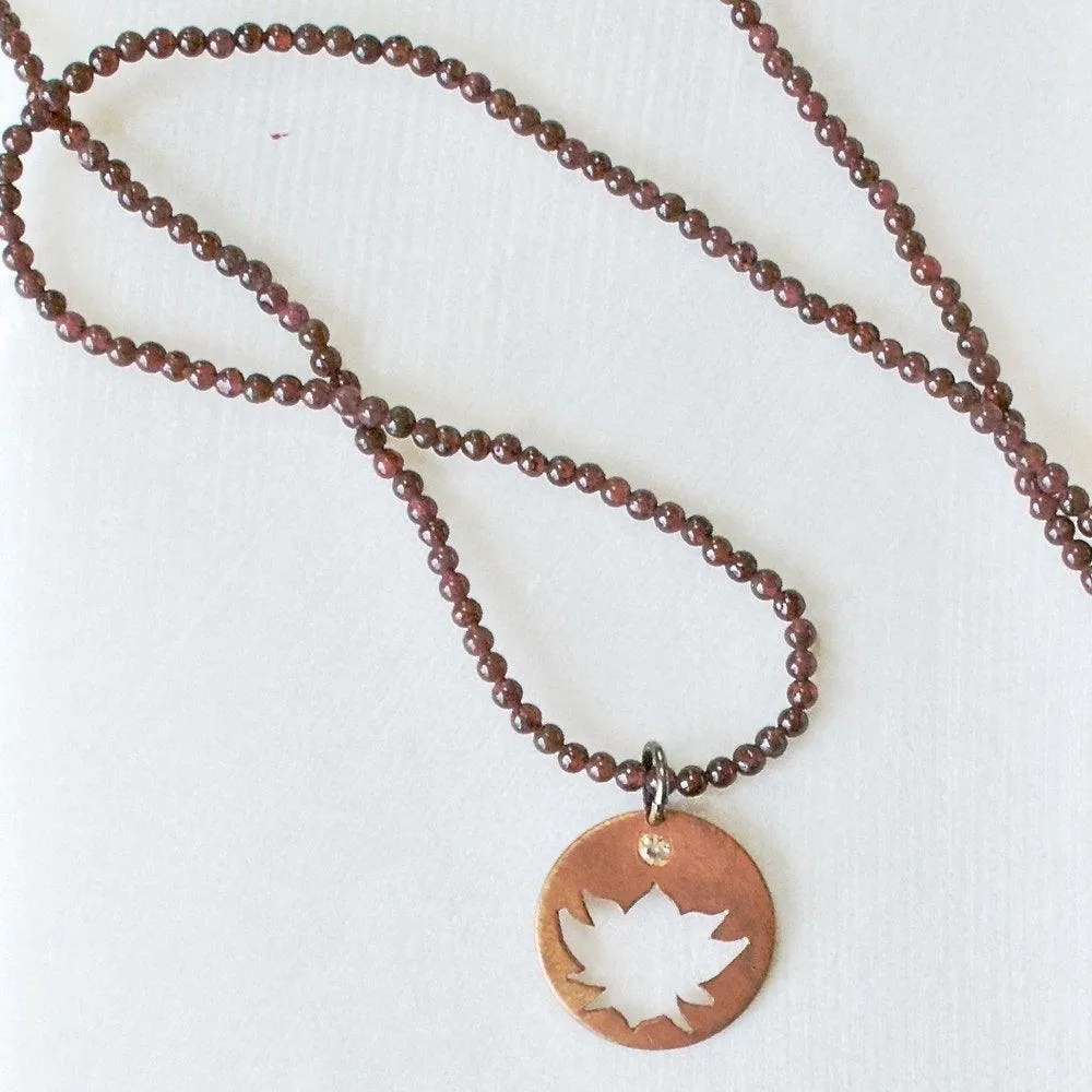 Mixed Garnet With Hand Cut Lotus Copper Charm & White Topaz