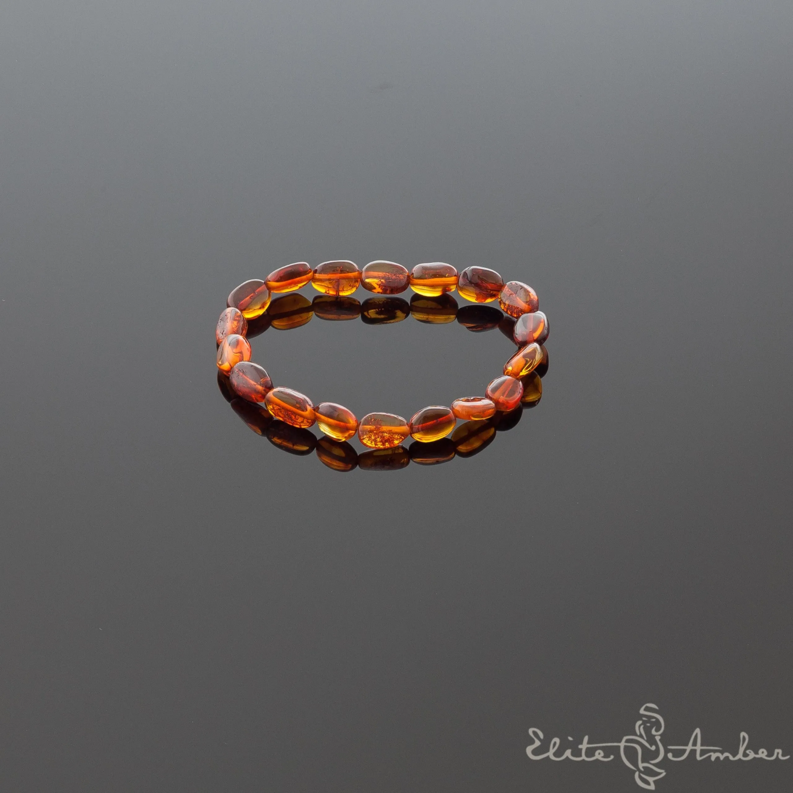 Polished amber pebbles bracelet