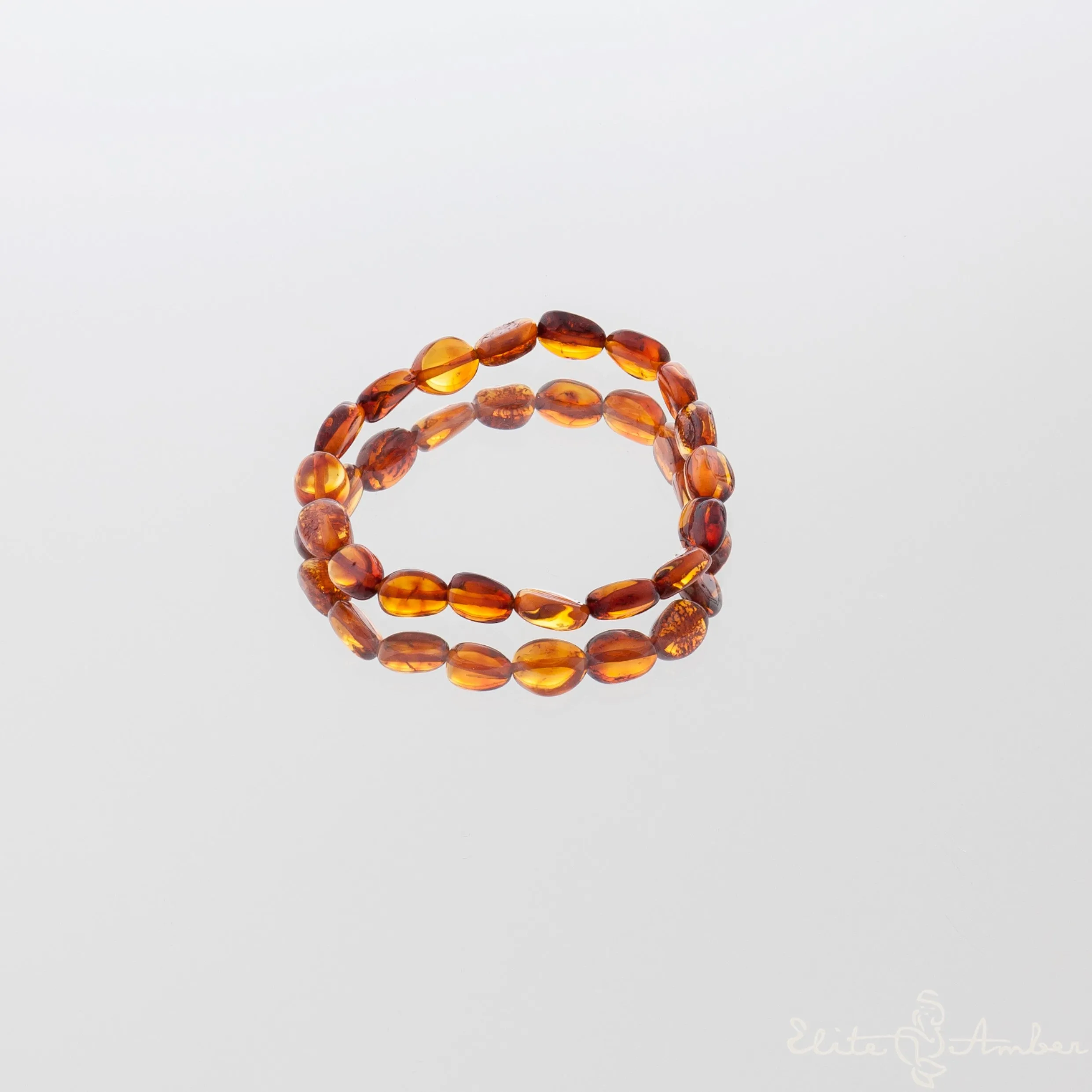 Polished amber pebbles bracelet