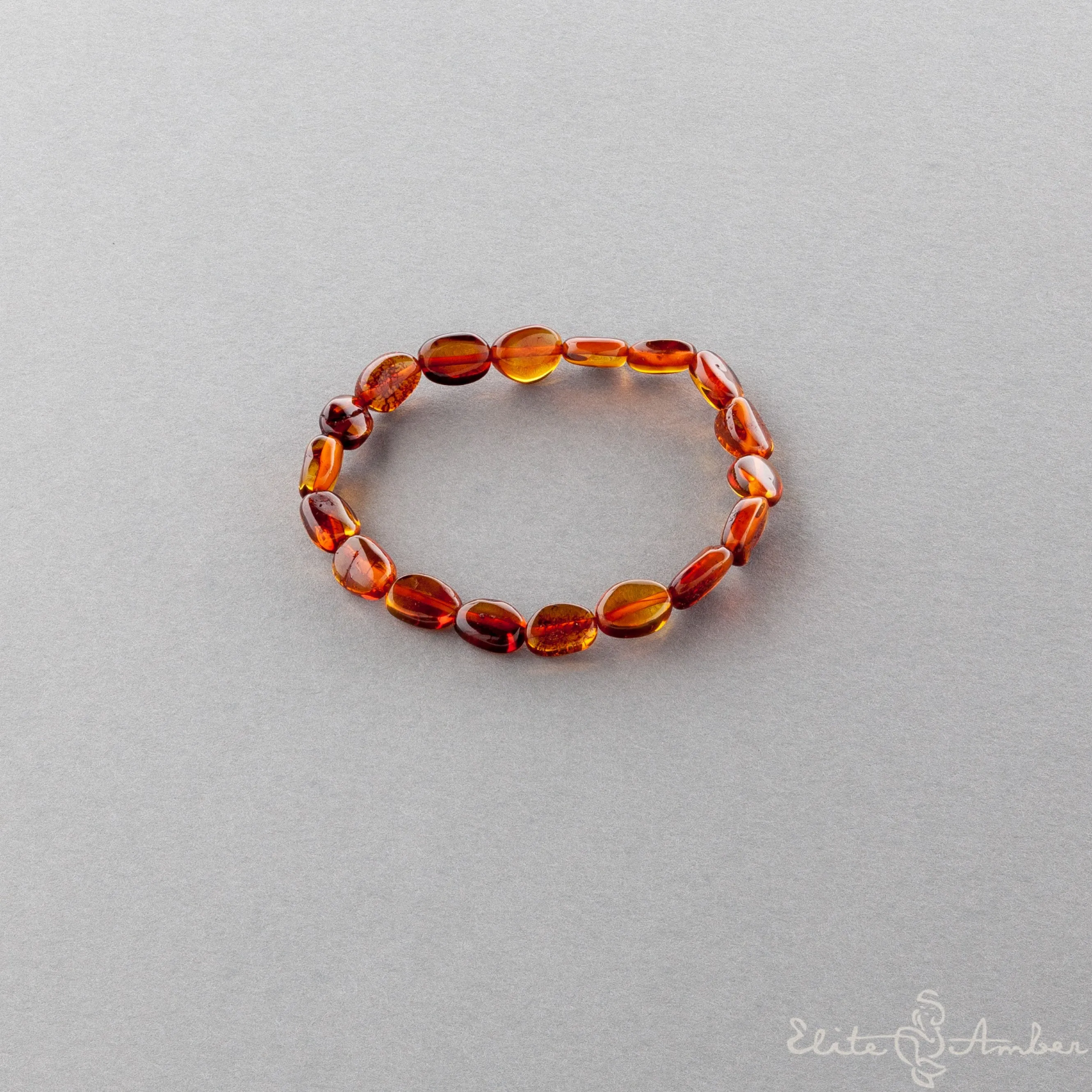Polished amber pebbles bracelet