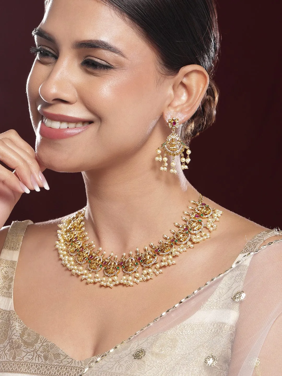 Rubans 22K Gold-Plated Ruby Pink, Emerald Green & White Cubic Zirconia Studded Divine Lakshmi Motif Temple Necklace Set
