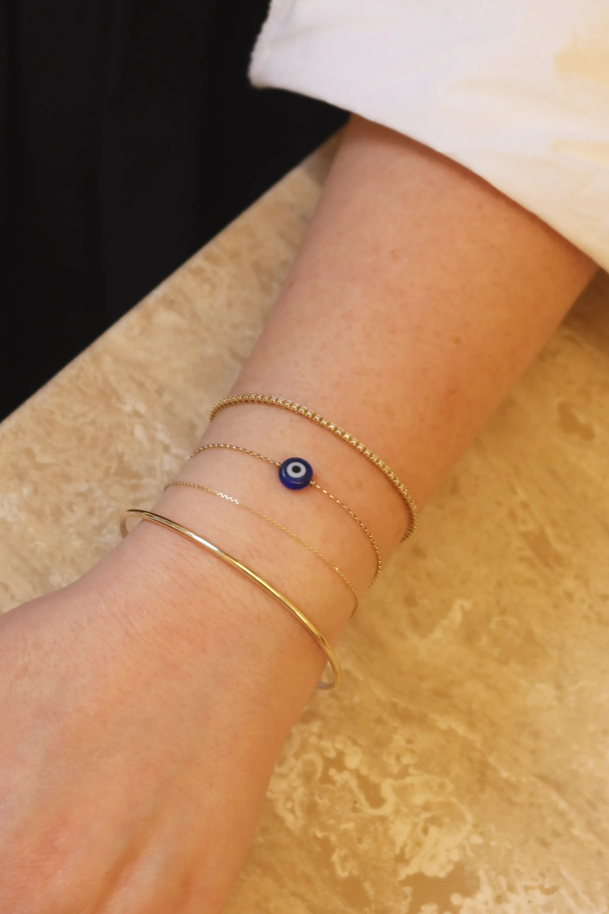 THE GOLD BANGLE