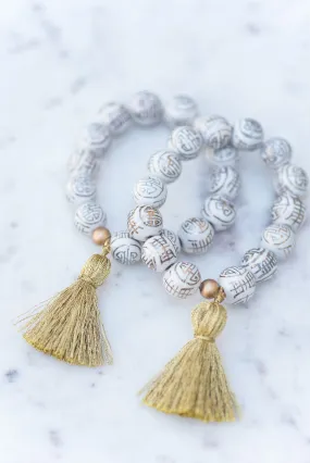 The Poinsett Tassel Bracelet in Metallic Gold